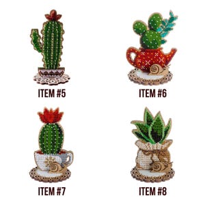 May include: A set of three ceramic mugs with a speckled, matte finish. The mugs are in shades of cream, light gray, and dark gray. Each mug has a simple, minimalist design and a rounded handle. The mugs are likely for coffee or tea.