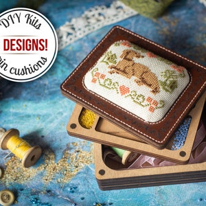 DIY box for handicraft with pin cushion for cross stitch embroidery. Travel needle case.