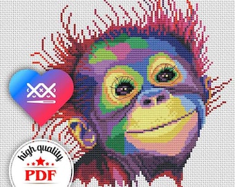 May include: Colorful cross-stitch pattern of an orangutan with a bright purple face, yellow eyes, and a big smile. The pattern is in a heart shape and includes the text "high quality PDF pattern".