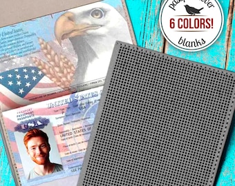 May include: A grey passport cover with a grid pattern. The cover is made of a textured material and has a stitched edge. The cover is shown with a US passport inside. The text "passport cover 6 COLORS! blanks" is printed on a white circle with a black border.