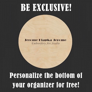 May include: A round wooden organizer with the text "Jerome Klapka Jerome Embroidery Art Studio" on it. The text "BE EXCLUSIVE!" is at the top of the image and the text "Personalize the bottom of your organizer for free!" is at the bottom of the image.