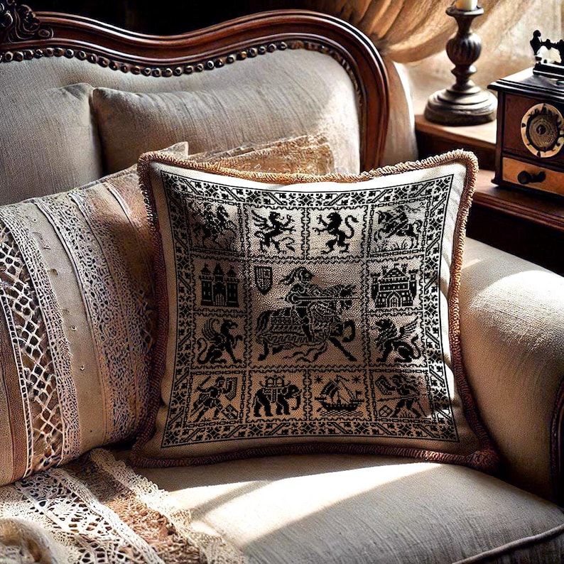 May include: Square cushion with a black and beige medieval design. The cushion features a repeating pattern of heraldic figures, castles, and a knight on horseback. It has a beige fringe trim and is on a cream-coloured armchair.