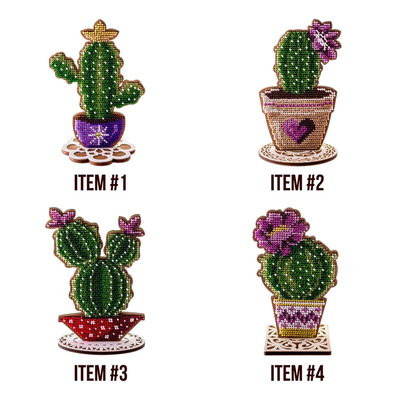 May include: Four decorative cactus designs, each in a pot, with the text "ITEM #" followed by a number. The cacti are green with purple flowers, and the pots have various colors and patterns. Each cactus sits on a decorative wooden base.