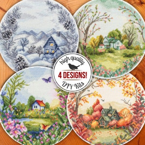 May include: Four round cross-stitch patterns featuring a house in a winter, spring, summer, and fall landscape. The patterns are surrounded by a wooden background and a white circle with the text "high quality 4 DESIGNS! DIY Kits".