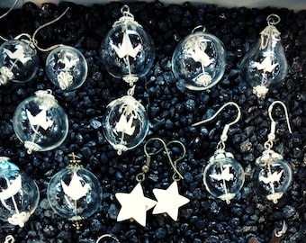 Folded origami cranes in glass ball jewelryset