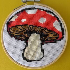 Fly agaric magical mushroom 4inch handmade cross stitch.
