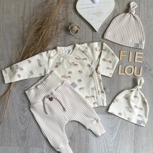 Baby set: wrap shirt, wrap jacket with hedgehogs/flamingo/penguin/seals/elephants+baggy pants, bloomers with cord and coconut button made of rib jersey