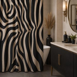 May include: A shower curtain featuring a bold, high-contrast zebra stripe pattern in black and beige. The fabric hangs in vertical folds, displaying a repeating organic design of flowing, irregular lines that span the entire surface area.