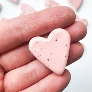 Small speckled pink ceramic heart magnet