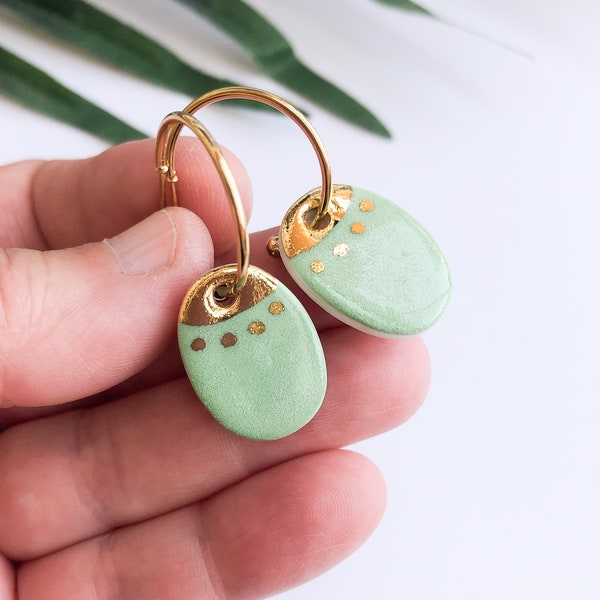 Pistachio green porcelain hoop earrings - gold plated