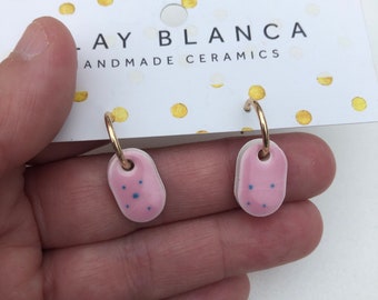 Speckled pink & blue oval earrings on small hoops
