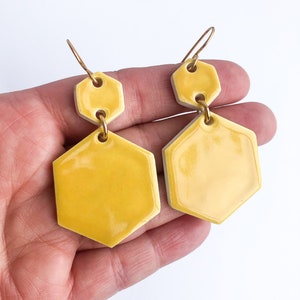 Yellow earrings on gold plated wires