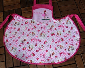 cute pink children's apron with name and little red riding hood motifs from size 92 to 110