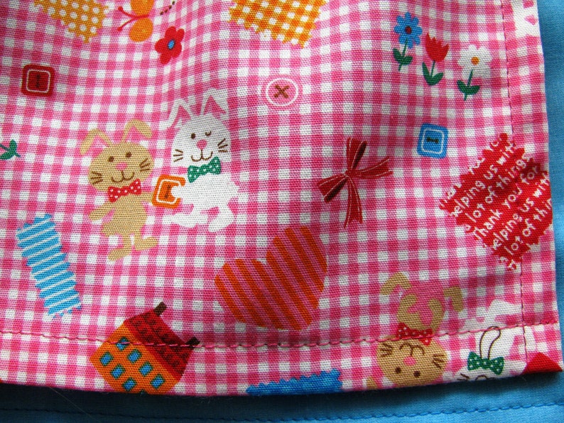 funny children's apron with name in turquoise/pink size. 86 to 122 image 4