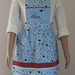 cute light blue children's apron with ladybird motif, with lace, personalized, only 1 x left in size 98 image 1