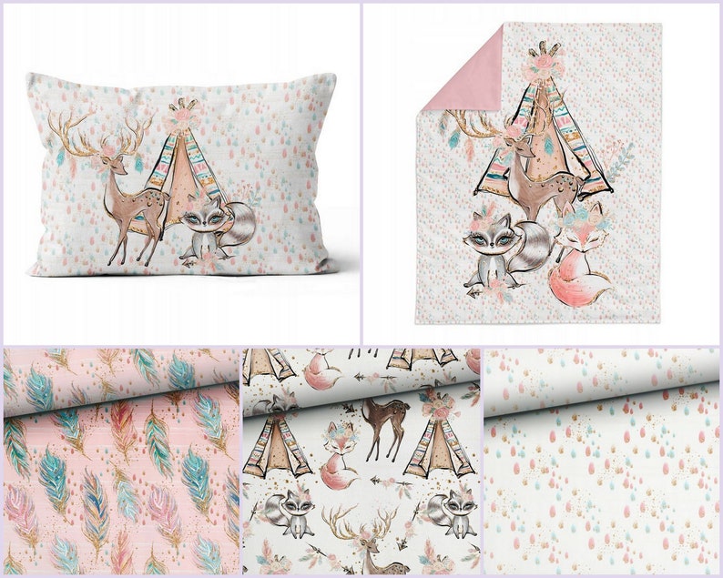 May include: A pink and white baby bedding set with a woodland theme. The set includes a pillow, a blanket, and three fabric swatches. The fabric swatches feature a variety of patterns, including feathers, arrows, and a teepee with animals.