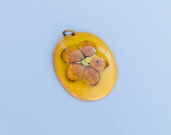 Vintage metal and resin oval flower pendant