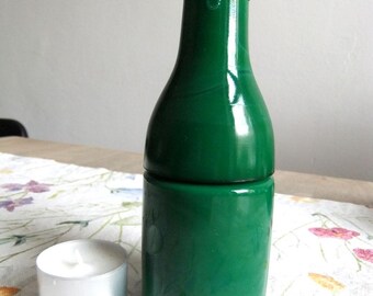 Senfglas in Form einer Champagnerflasche