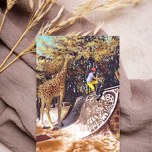 Postal "girafa e skatista"