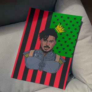 May include: A rectangular art print with a portrait of a man. The design incorporates a flag with red and black stripes, a green section with black stars, and a gold crown. The man has a stern expression.