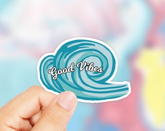 May include: A blue wave sticker with the text "Good Vibes" in white. The sticker is on a white background.