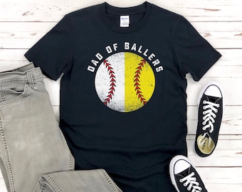May include: Black t-shirt with a white and yellow baseball graphic and the text "Dad of Ballers".