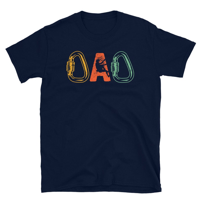 May include: A navy blue t-shirt with the word "DAD" in a retro font. The letters are outlined in orange, green, and yellow. The "A" is replaced with a silhouette of a person climbing a rock wall.