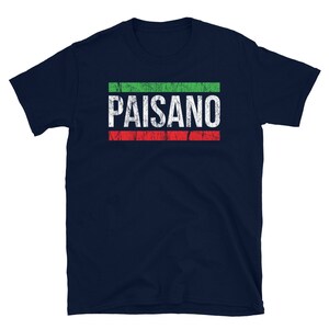 May include: A navy blue t-shirt with the word "PAISANO" printed in white with a green and red stripe design.