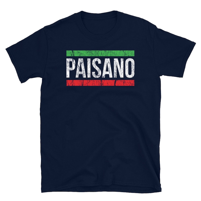 May include: A navy blue t-shirt with the word "PAISANO" printed in white with a green and red stripe design.