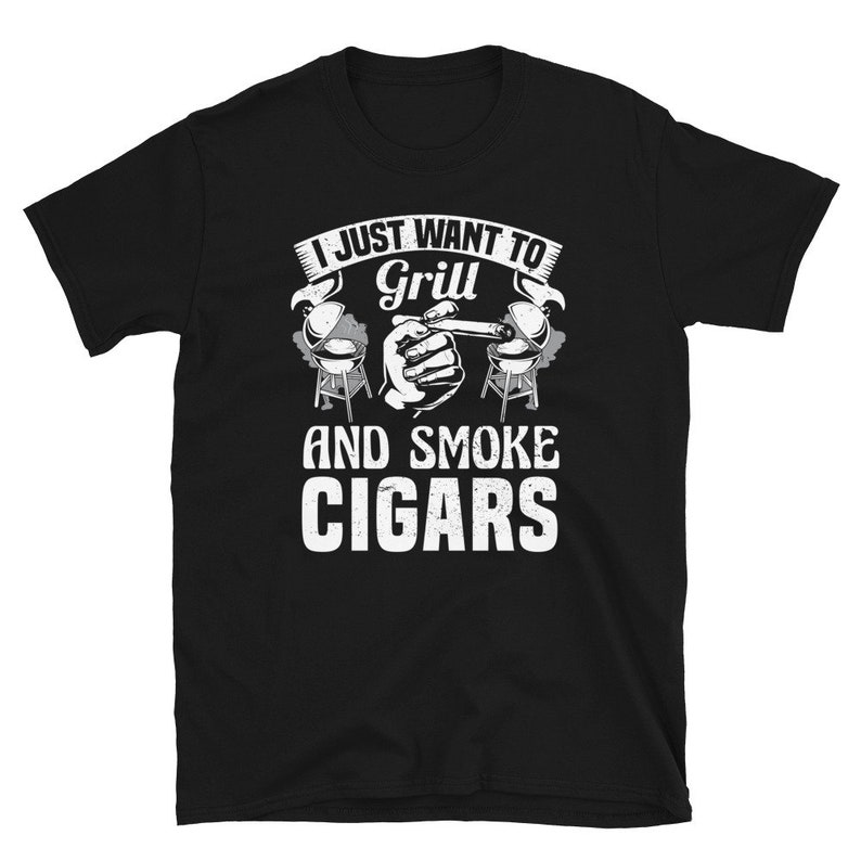 May include: Black t-shirt with white text that reads "I just want to grill and smoke cigars". The text is surrounded by a graphic of a hand holding a cigar and two grills.