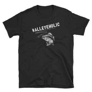 May include: Black short-sleeved t-shirt with white text that reads "WALLEYEHOLIC" and a graphic of a walleye fish with a fishing line and hook.