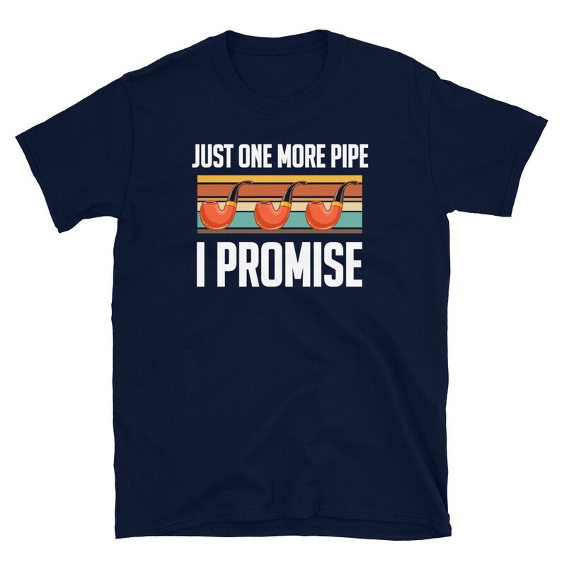 May include: Navy blue t-shirt with a vintage-style graphic of three pipes and the text "Just One More Pipe I Promise".
