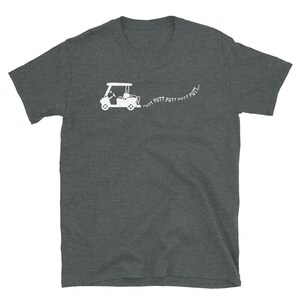 May include: A dark heather grey t-shirt with a white graphic of a golf cart and the text "PUTT PUTT PUTT PUTT..."