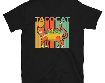 May include: Black t-shirt with a retro-style graphic of a cat dressed as a taco. The text "Taco Cat" is above the cat.