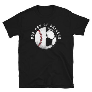 May include: Black t-shirt with a white graphic of a baseball and soccer ball with the text "Pop Of Ballers".
