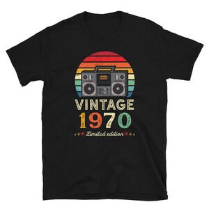 May include: Black t-shirt with a vintage-style illustration of a boombox and the text "Vintage 1970 Limited edition".