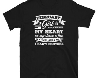 May include: Black t-shirt with white text that reads "FEBRUARY = Girl I WAS BORN WITH MY HEART on my sleeve a fire IN MY SOUL AND A MOUTH I CAN'T CONTROL"