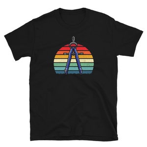 May include: A black t-shirt with a vintage-style graphic of a compass on a rainbow sunset background.