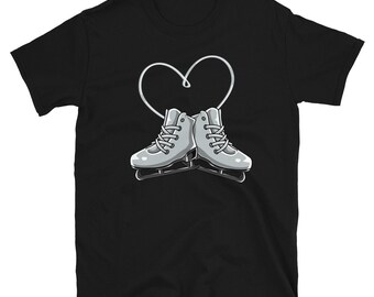 May include: Black t-shirt with a white heart design featuring two ice skates. The skates are facing each other with the laces tied.