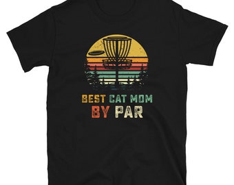 May include: Black t-shirt with a retro-style graphic of a disc golf basket and the text "Best Cat Mom By Par".