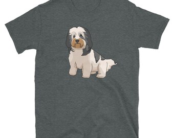May include: A dark heather grey t-shirt with a cartoon illustration of a white and black dog with brown ears. The dog is sitting down and looking to the left.