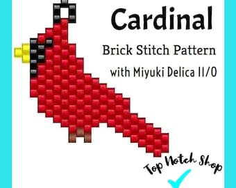Puede incluir: Un patrón de punto de ladrillo para un cardenal rojo, utilizando cuentas Miyuki Delica 11/0. El patrón es para un cardenal pequeño con cabeza negra y pico amarillo. El patrón es de Top Notch Shop.