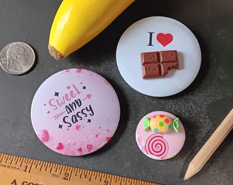 3 Piece Candy Lover Novelty Pin Set - 3 Pinback Buttons: I Heart Chocolate (3D charm), Sweet and Sassy, Piece of Wrapped Candy (3D charm)