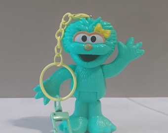 Rosita Toy Figurine Upcycled Keychain - Thrifted Sesame Street Character Made into a Zipper or Bottle Charm, Backpack Accessory or Key Chain