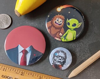 3 Piece "There are Monsters Among Us" Theme Novelty Pin Set - 3 Graphic Pinback Buttons: Invisible Man, Sasquatch & Alien, Frankenstein