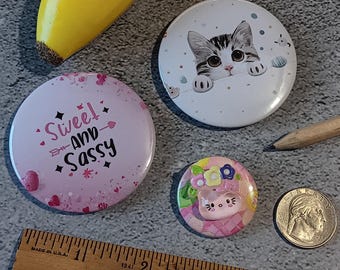 3 Piece Pretty Kitty in Pink Novelty Pin Set - 3 Pinback Buttons: Sweet and Sassy, Peekaboo Kitten, 3D Charm Cat Wearing Pastel Floral Hat