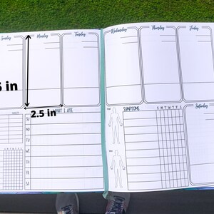 May include: A weekly planner with sections for sleep, what you ate, symptoms, and a daily log. The planner is open to show the daily log section, which is divided into seven columns for each day of the week. The planner measures 5 inches tall and 2.5 inches wide.