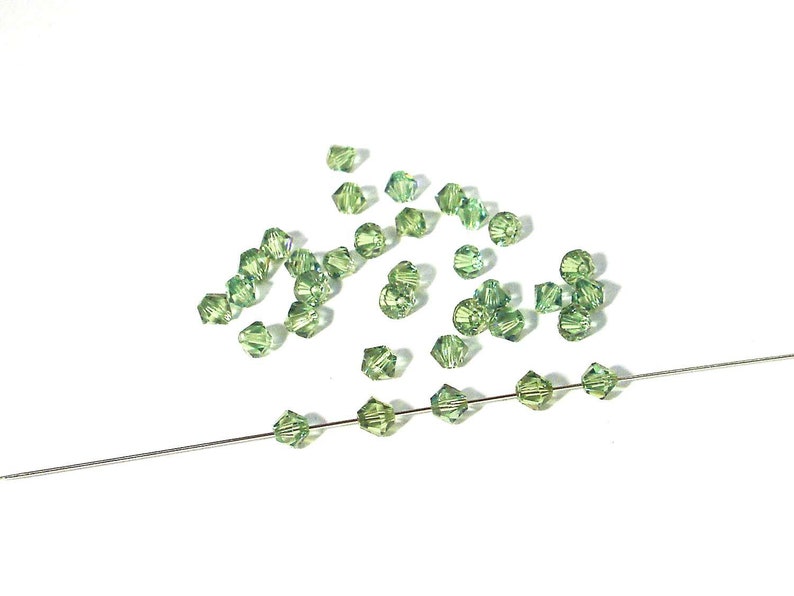 4mm Bicone 50 pcs #sw26 violet AB Swarovski ® perles