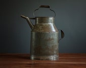 Large antique steel water carrier