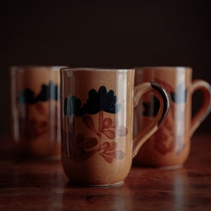 3x vintage pottery mugs, hand painted floral cups, earth tones, rustic cottage aesthetic